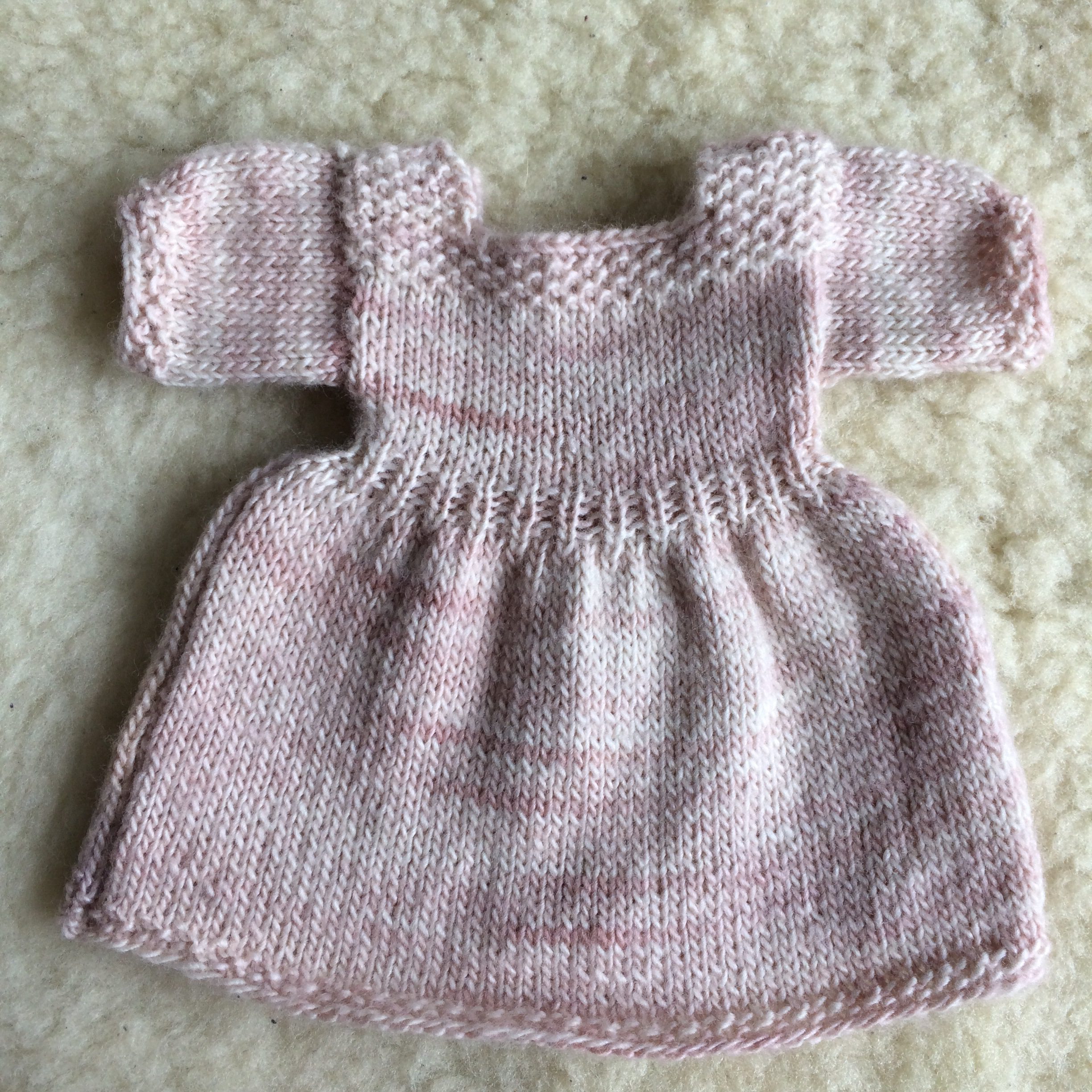 Zachtroze jurkje merinowol